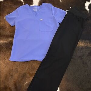 FIGS purple Scrub Top and black pants